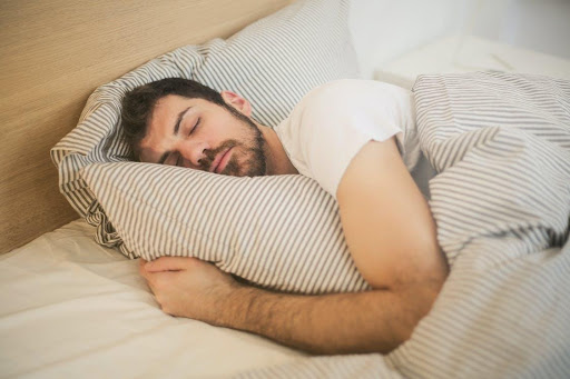 a man sleeping with the help of sleep aid soft gel